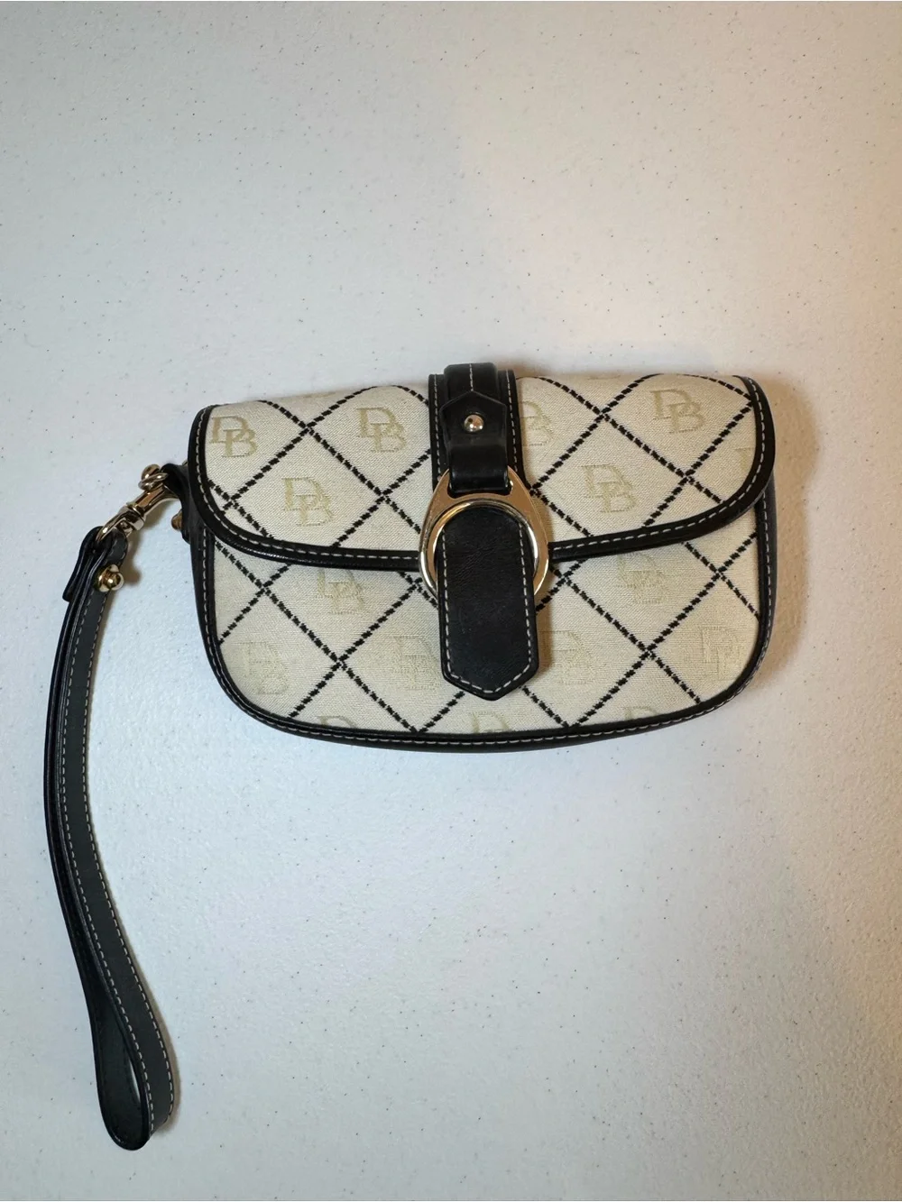 Dooney & Bourke Cream and navy Wristlet with Logo Diamond Pattern